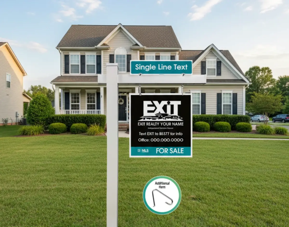 EXIT Realty for sale sign hanging from a white post with a teal single line text rider above it in a residential neighborhood